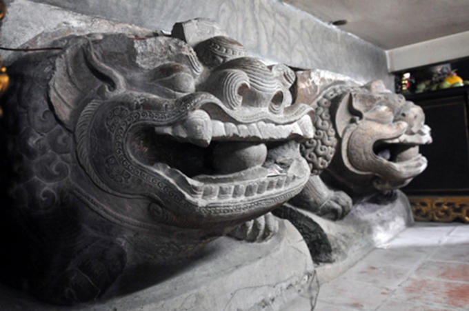 Tượng sư tử bằng đá thế kỷ XI - XII tại chùa Bà Tấm, Dương Xá, Gia Lâm, Hà Nội. Ảnh: Internet