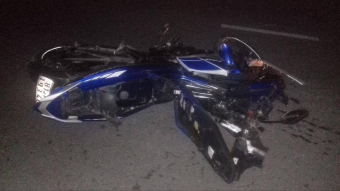 Chiếc xe máy của nạn nhân tại hiện trường.