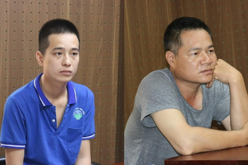 Lã Duy Thắng (áo xanh) và Nông Văn Trọng tại cơ quan Công an do liên quan đến vụ án lừa bán đồi cây. (Ảnh: Công an Bắc Kạn).