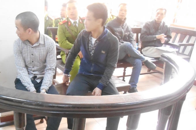 Bị cáo Lê Văn Qúy và Nguyễn Trường Giang tại phiên tòa hôm nay 11/12 (Ảnh Nguyễn Xinh)