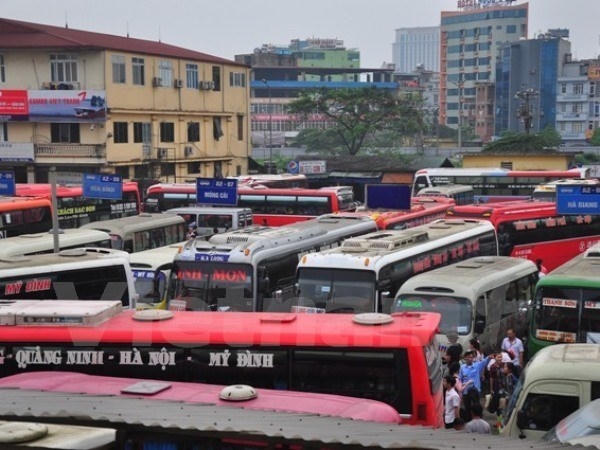 Việc điều chuyển xe từ bến Mỹ Đình về Nước Ngầm với mục tiêu dứt khoát không để xe khách chạy xuyên tâm. (Ảnh: Việt Hùng/Vietnam+)