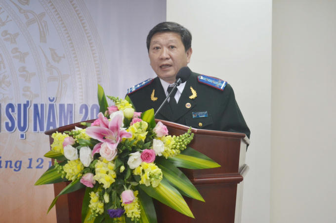 Ông Trần Hữu Thọ- Cục trưởng Cục THADS tỉnh Lâm Đồng báo cáo kết quả công tác thi hành án dân sự năm 2017.