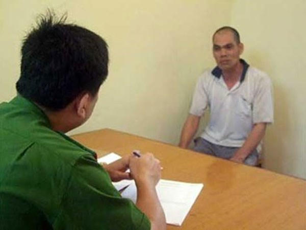 Đối tượng Ban Văn Pẩu tại cơ quan Công an. (Ảnh: báo An ninh thủ đô)