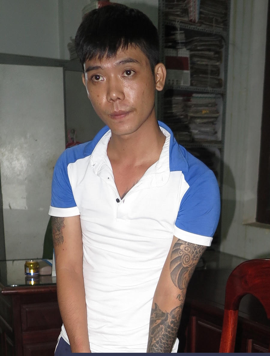 Nghi phạm Ngô Đình Hân tại cơ quan công an. Ảnh: T.N