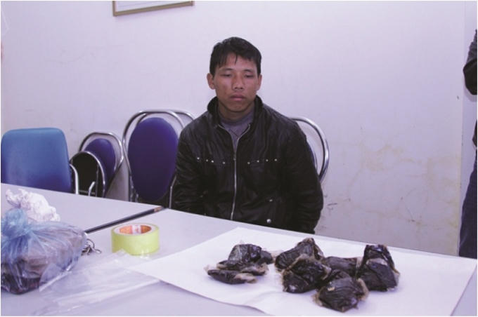 Đối tượng Chang A Và cùng tang vật vụ án.