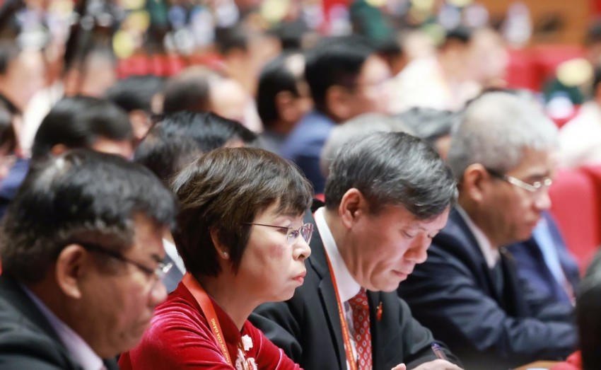 Các đại biểu dự phiên thảo luận tại hội trường về các văn kiện Đại hội, sáng 21/1. (Ảnh: TTXVN)