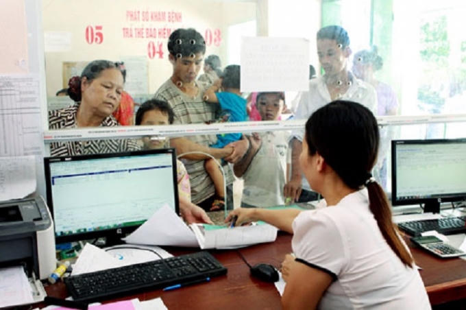 Thanh toán bảo hiểm y tế và khám chữa bệnh tại Bệnh viện Đa khoa huyện Đại Từ, Thái Nguyên. Ảnh: Dương Ngọc.