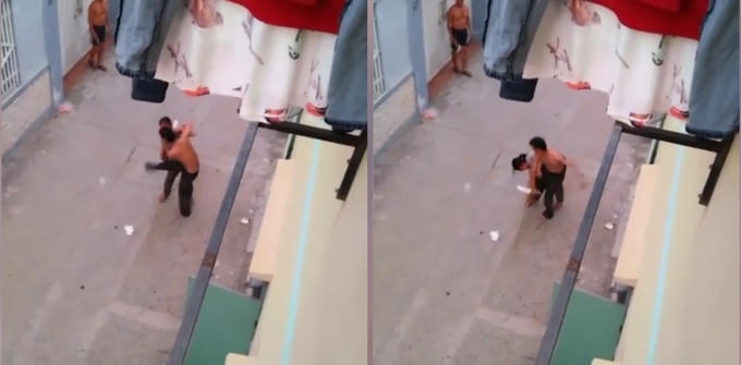 Sau khi c&atilde;i v&atilde;, người đ&agrave;n &ocirc;ng đ&atilde; d&ugrave;ng sao cứa cổ vợ m&igrave;nh. (Ảnh: Cắt từ clip).