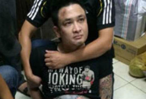 Đức "Cổ Lễ" bị Công an Hà Nội bắt giữ cùng 2 khẩu súng vào tháng 9/2014 (Ảnh: báo Thanh Niên).