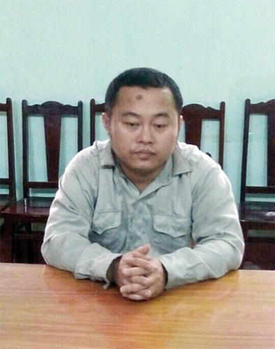 Phạm Thế Anh tại cơ quan công an.