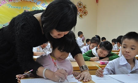 Th&ocirc;ng tư 30 đ&atilde;&nbsp;v&agrave;o thực tế từ năm học 2014-2015 &nbsp;nhưng đến nay vẫn c&ograve;n nhiều bất cập.&nbsp;Ảnh minh họa.&nbsp;