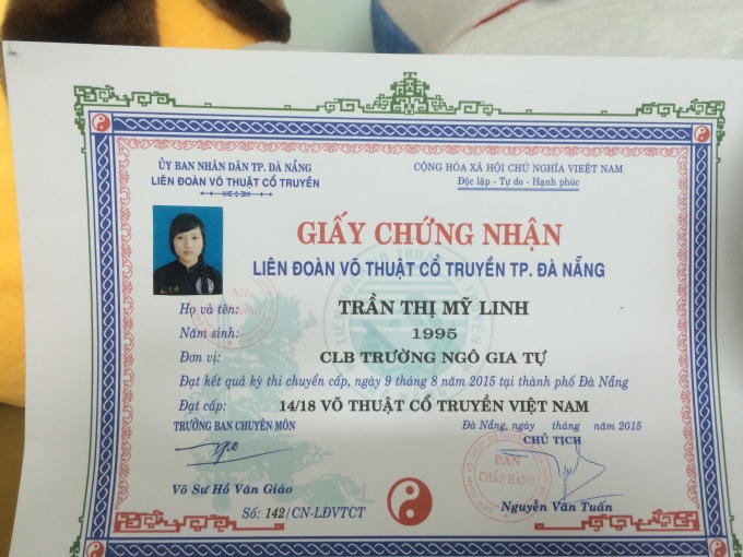 Giấy chứng nhận của Trần Thị Mỹ Linh trong Liên đoàn Võ thuật cổ truyền TP Đà Nẵng.