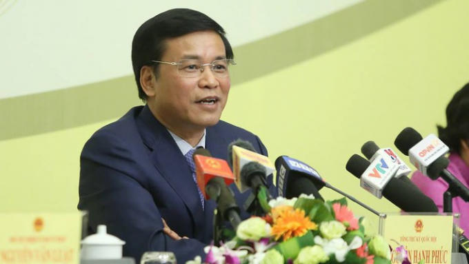 Tổng thư ký Quốc hội Nguyễn Hạnh Phúc trả lời báo chí tại cuộc họp báo - Ảnh: Quang Phúc