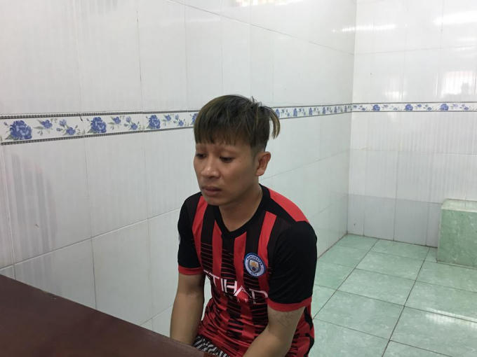 Huỳnh Ngọc Quốc tại cơ quan công an.