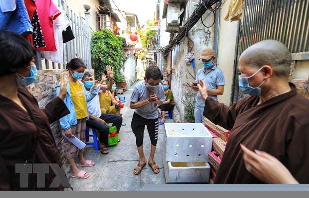 Nhung tam long hao tam danh cho nguoi dan 'xom chay than' mua dich hinh anh 1