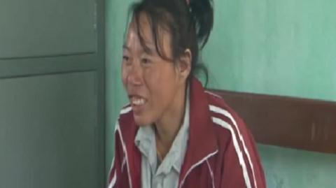 Đối tượng Nguyễn Thị Thực tại cơ quan công an.