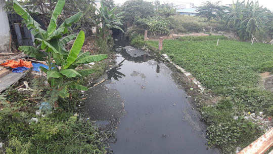 500 m tại Khe Cạn chưa được giải tỏa, đền bù khiến dự án thoát nước thải bị chậm tiến độ.