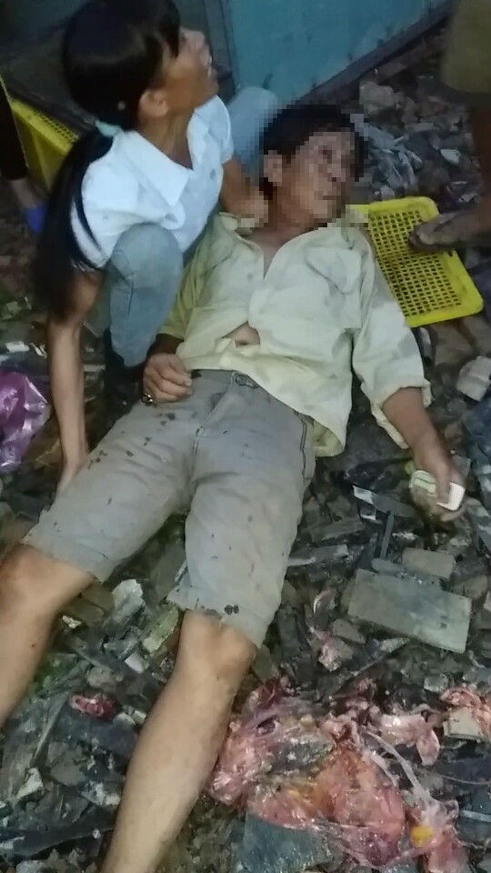 Ông Đ. bán rau, cá gần khu đất bị cưỡng chế, đã bị lực lượng được cho là của phường Tân Hiệp đánh ngất xỉu.