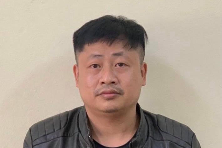 Đối tượng Nghiêm Xuân Cao tại cơ quan Công an.