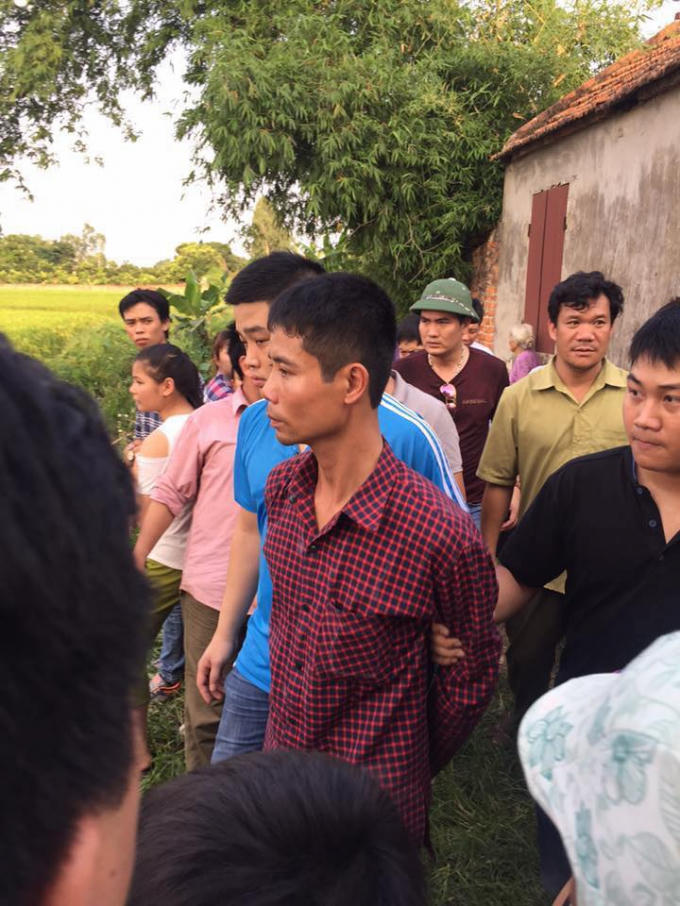 Phan Văn Tuấn khi bị công an bắt.