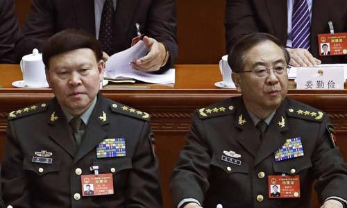 Ông Trương Dương (trái) và ông Phòng Phong Huy bị khai trừ khỏi đảng Cộng sản Trung Quốc. Ảnh: AP.