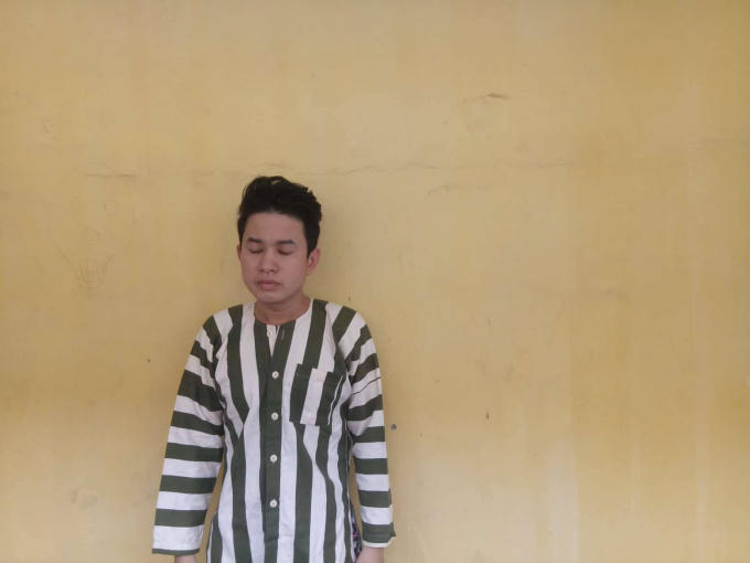 Nguyễn Tấn Lộc tại cơ quan công an.