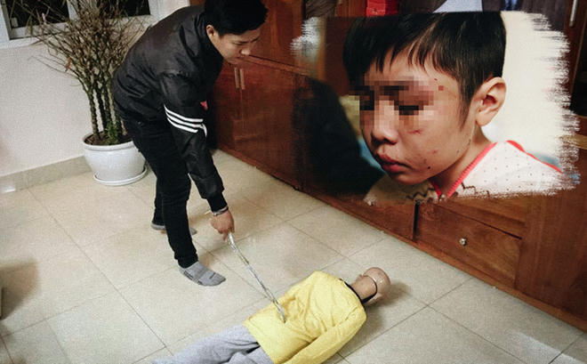 Trần Hoài Nam thực nghiệm hiện trường việc đánh con trai.