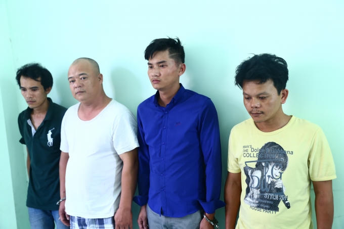 Bốn đối tượng tại cơ quan chức năng.