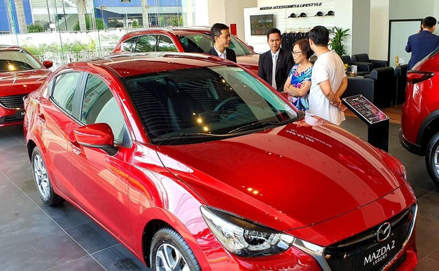 Việc lệ phí trước bạ giảm nhưng giá ô tô không còn được khuyến mại nhiều có thể làm mất niềm tin của khách hàng