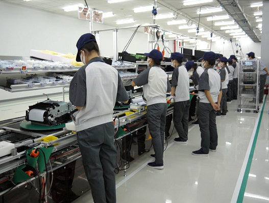 Một góc dây chuyền lắp ráp máy in mầu tại Fuji Xerox Hải Phòng.