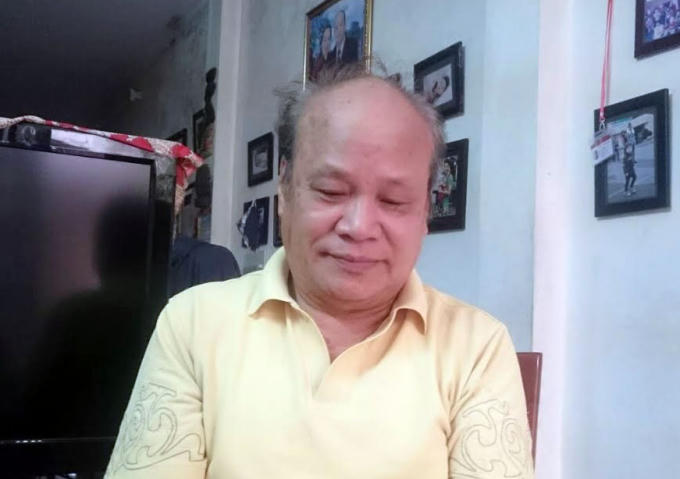 Ông Vũ Hiền đang trầm ngâm nhớ lại một thời sôi nổi gắn liền với những ngày lao động công ích đào hồ Thành Công gần 40 năm trước. (Ảnh: Nguyễn Cảnh)