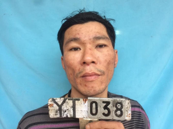 Đặng Quang Vỵ người đã dùng dao, lựu đạn chống đối lực lượng chức năng.