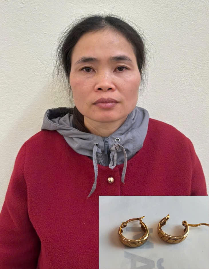 Đối tượng Đinh Thị Kim cùng tang vật của vụ án.