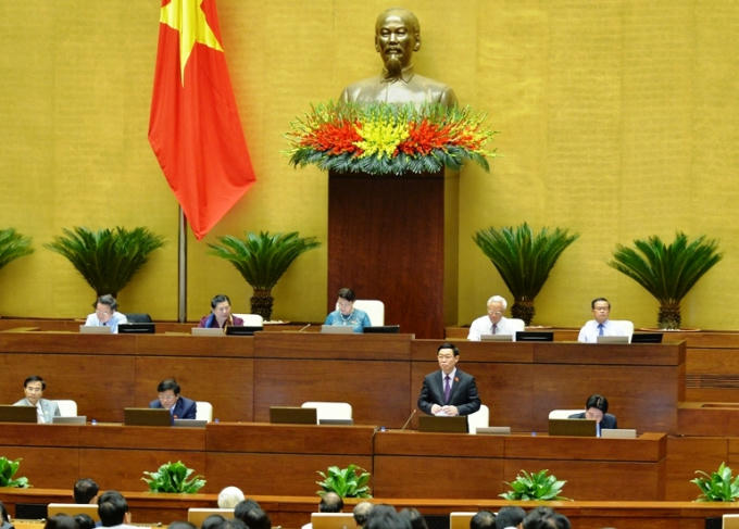 Phó Thủ tướng Vương Đình Huệ trả lời chất vấn trước Quốc hội. Ảnh: VGP/Nhật Bắc