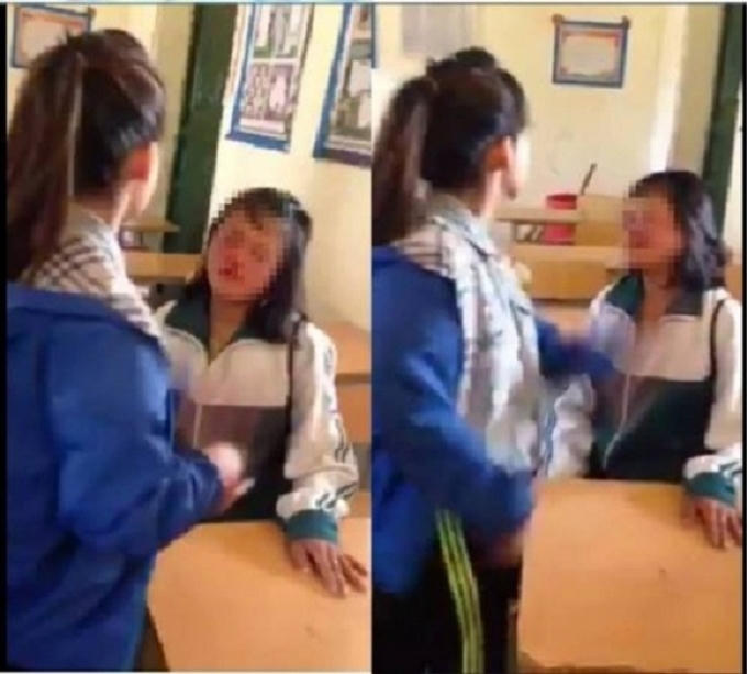 Nữ sinh tát bạn 50 cái ngay tại lớp học (ảnh cắt từ clip).