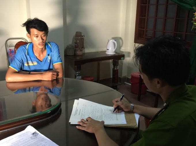 Dũng tại cơ quan công an.