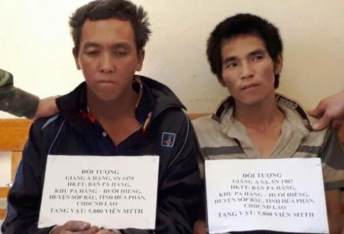 Hai đối tượng Giàng A Hạng và Giàng A Sa tại cơ quan điều tra.