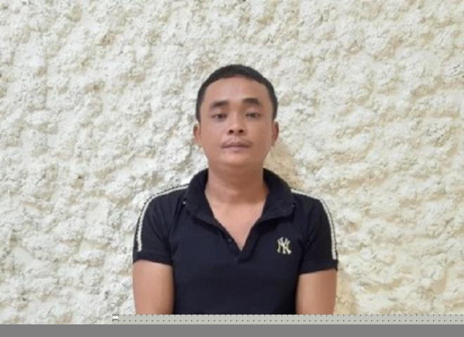 Trần Minh Trường bị bắt giữ.
