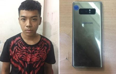 Đối tượng Đàm Trần Thanh Sang cùng tang vật tại cơ quan điều tra.