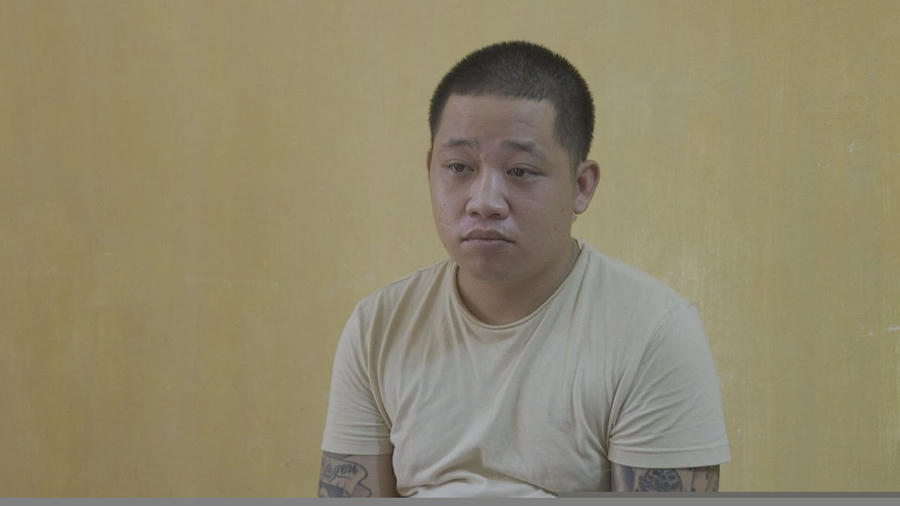 Nguyễn Minh Lưu tại cơ quan công an.