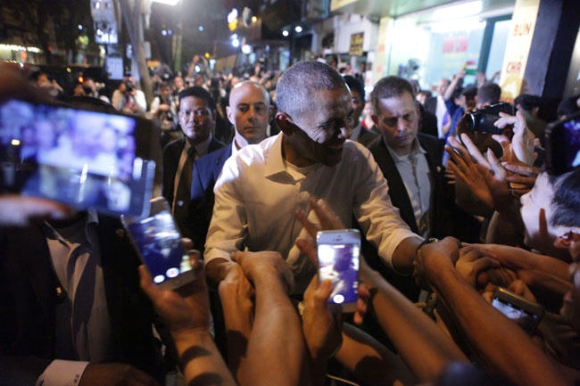 Tổng thống Obama luôn cười vui vẻ. (Ảnh:Reuters)