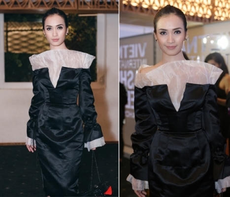 Bộ váy của Ái Phương trông có vẻ khá "kiên cố", có lẽ công dụng của mảnh chắn màu trắng kia để bảo vệ cơ thể một cách "tối đa" khỏi những ánh nhìn của người đối diện. Cô xứng đáng nhận được danh hiệu "nghệ sỹ cẩn thận" nhất của năm với bộ trang phục này. Ảnh: internet.