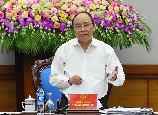 Thủ tướng phát biểu tại Hội nghị trực tuyến bàn các giải pháp đẩy mạnh thực hiện bảo hiểm y tế toàn dân (Ảnh: VGP/Quang Hiếu).