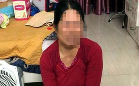 Người phụ nữ bị tố nhiều lần bạo hành cháu bé sơ sinh.