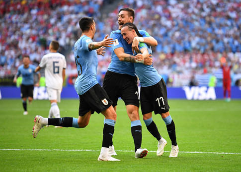 Các cầu thủ Uruguay có chiến thắng tưng bừng 3-0 trước chủ nhà Nga vận hành không tốt. Ảnh REUTERS