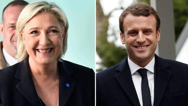 Ứng viên Marine Le Pen (trái) và ứng viên Emmanuel Macron. (Ảnh: AFP)