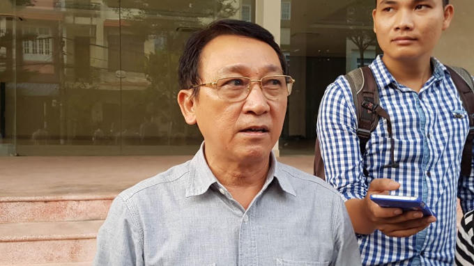 Ông Huỳnh Tấn Vinh trong một lần trả lời báo chí. Ảnh: Đình Thiên.