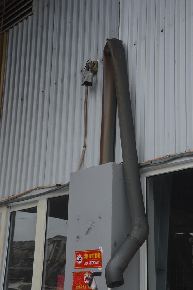 Khung cảnh tan hoang của 10.000m2 nhà xưởng cty May Nhà Bè sau vụ cháy - ảnh 5