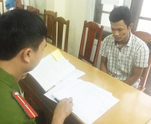 Hà Văn Tuấn tại cơ quan công an. Ảnh: Công an cung cấp.