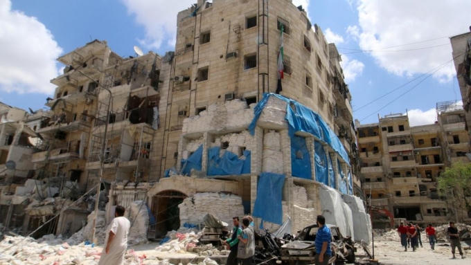 Bệnh viện Al Quds ở Aleppo bị không kích hôm 28/4 (Ảnh: Telegraph)